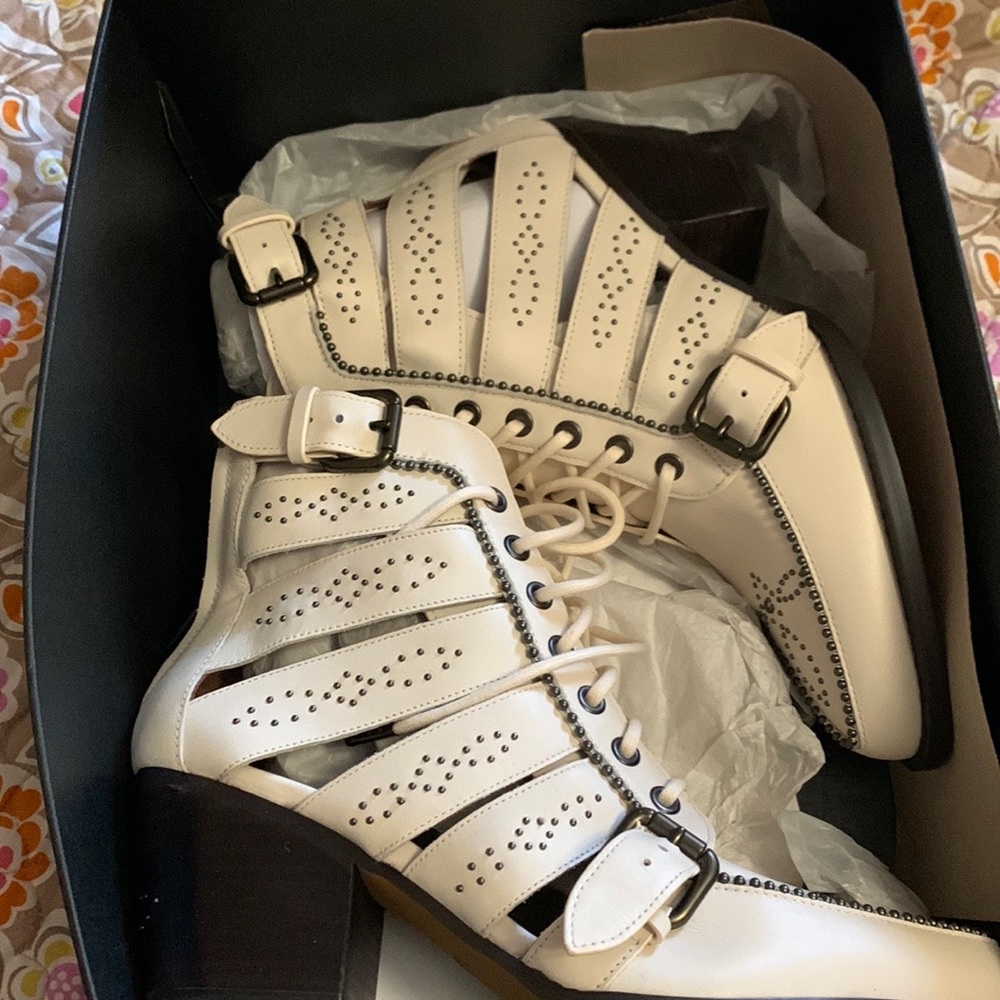 Coach booties with cut outs and metal beads